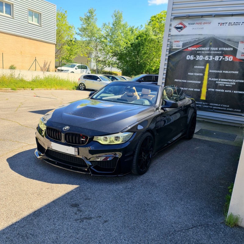 Pose de film solaire avec feux teintées sur cette Bmw m4