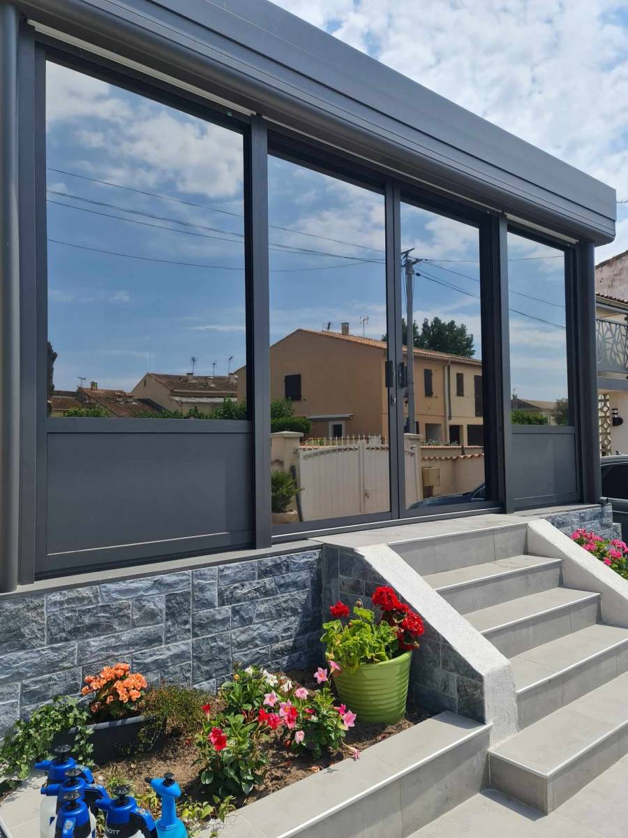 Pose de traitement solaire sur cette véranda 