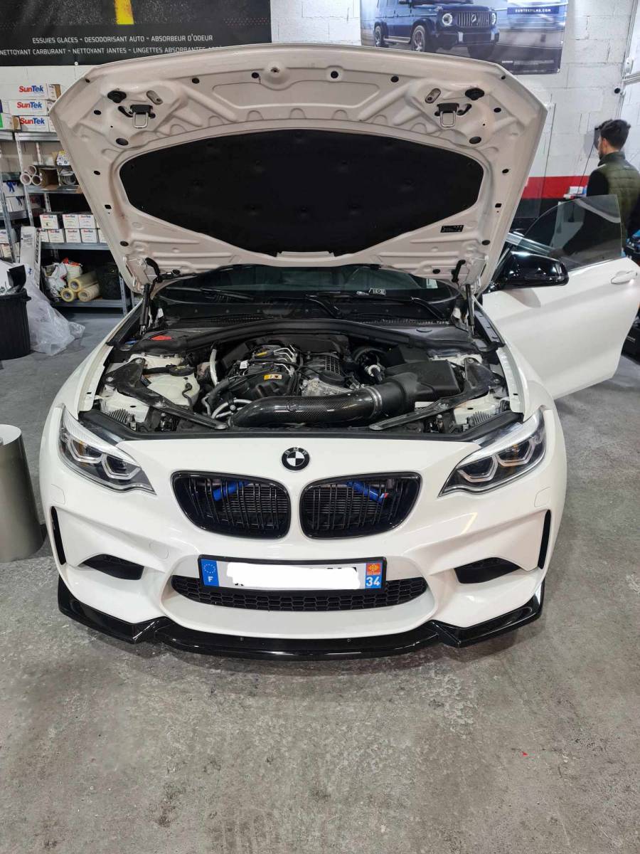 Feux teintés sur cette Bmw m2 sur Juvignac 